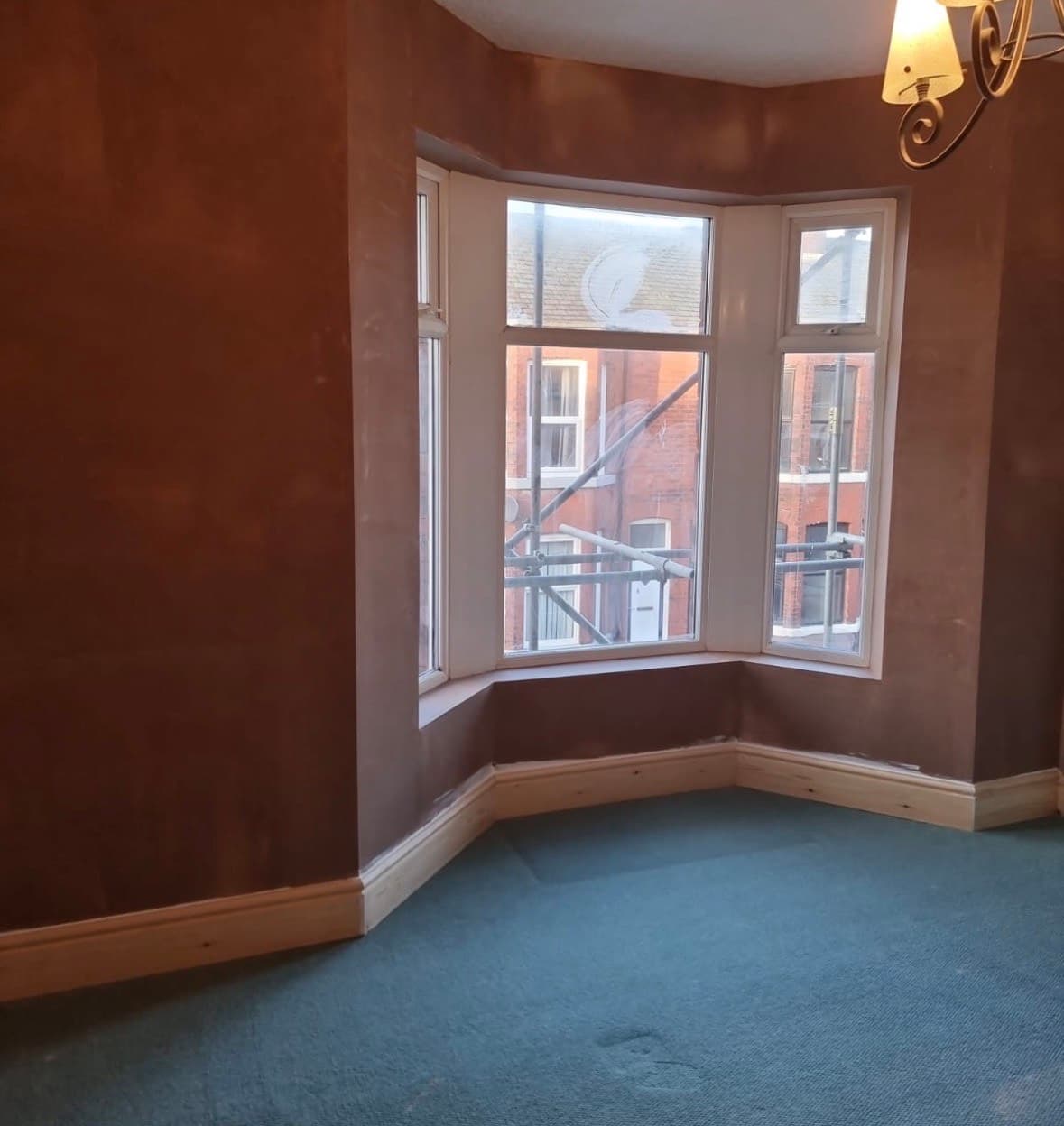 Internal wall insulation installation in a bay window room