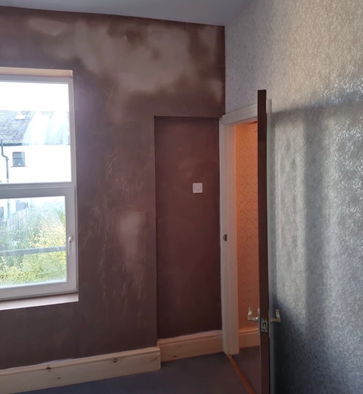 Internal wall insulation preparation in a bedroom